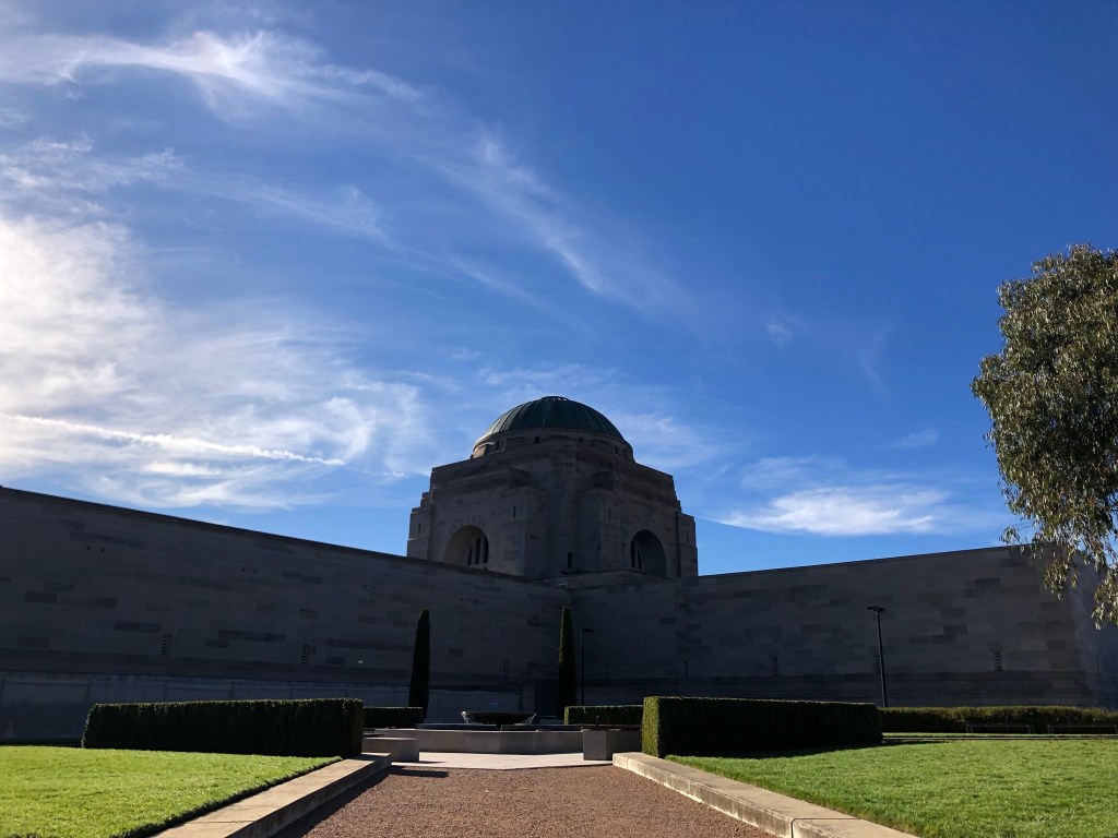 Australian War Memorial in front of clear blue sky. 