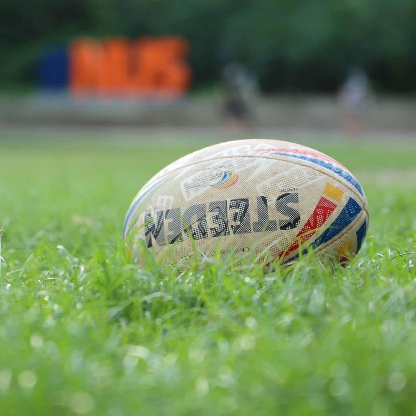 Steeden rugby league ball sitting on the grass