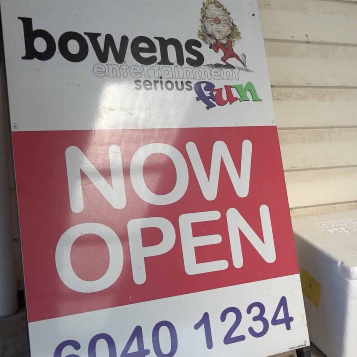 Sign reading 'Bowens Serious Fun: Now Open'
