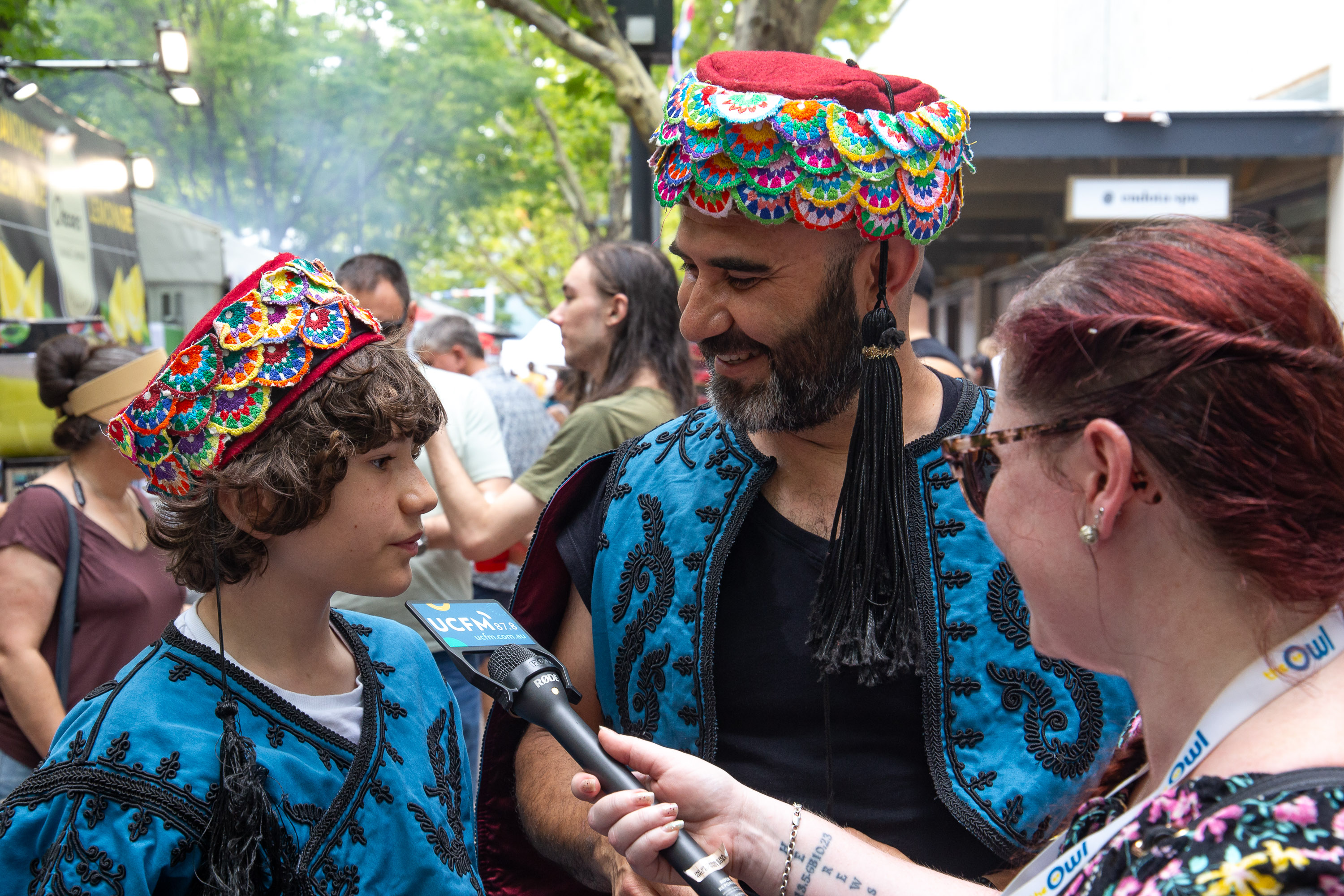 Lila interviewing Oscar and his son