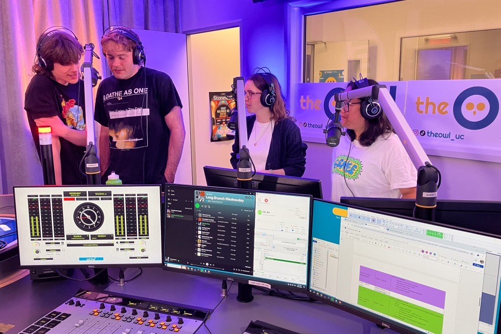 Tia and AJ interview Herald in the UCFM studio
