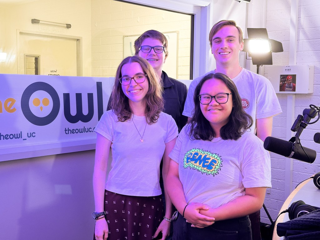 Tia, Tobias, AJ and Zac posing in the UCFM studio