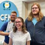 Josh, Tia and Ben pose in the UCFM studio