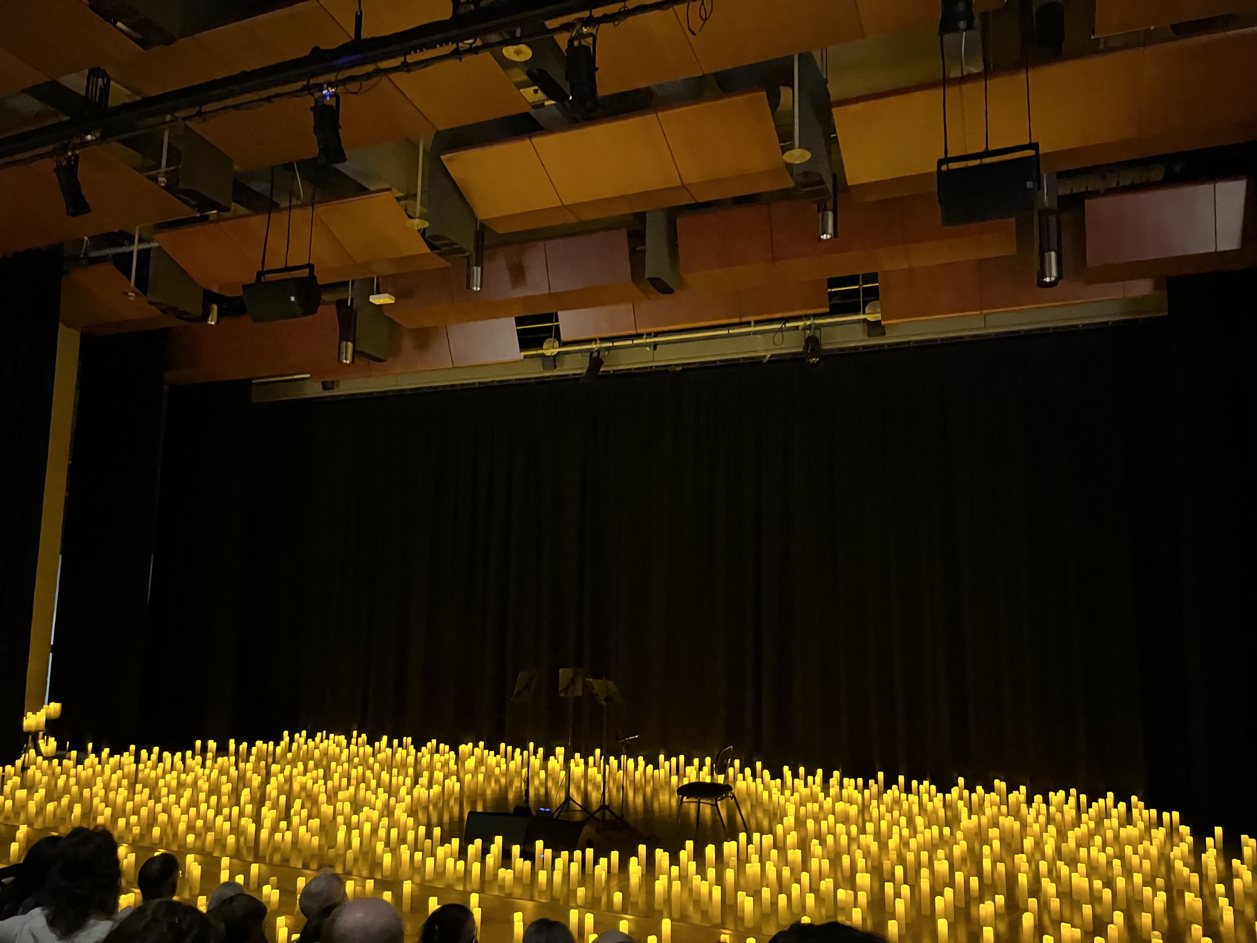 Empty stage with candles on it.