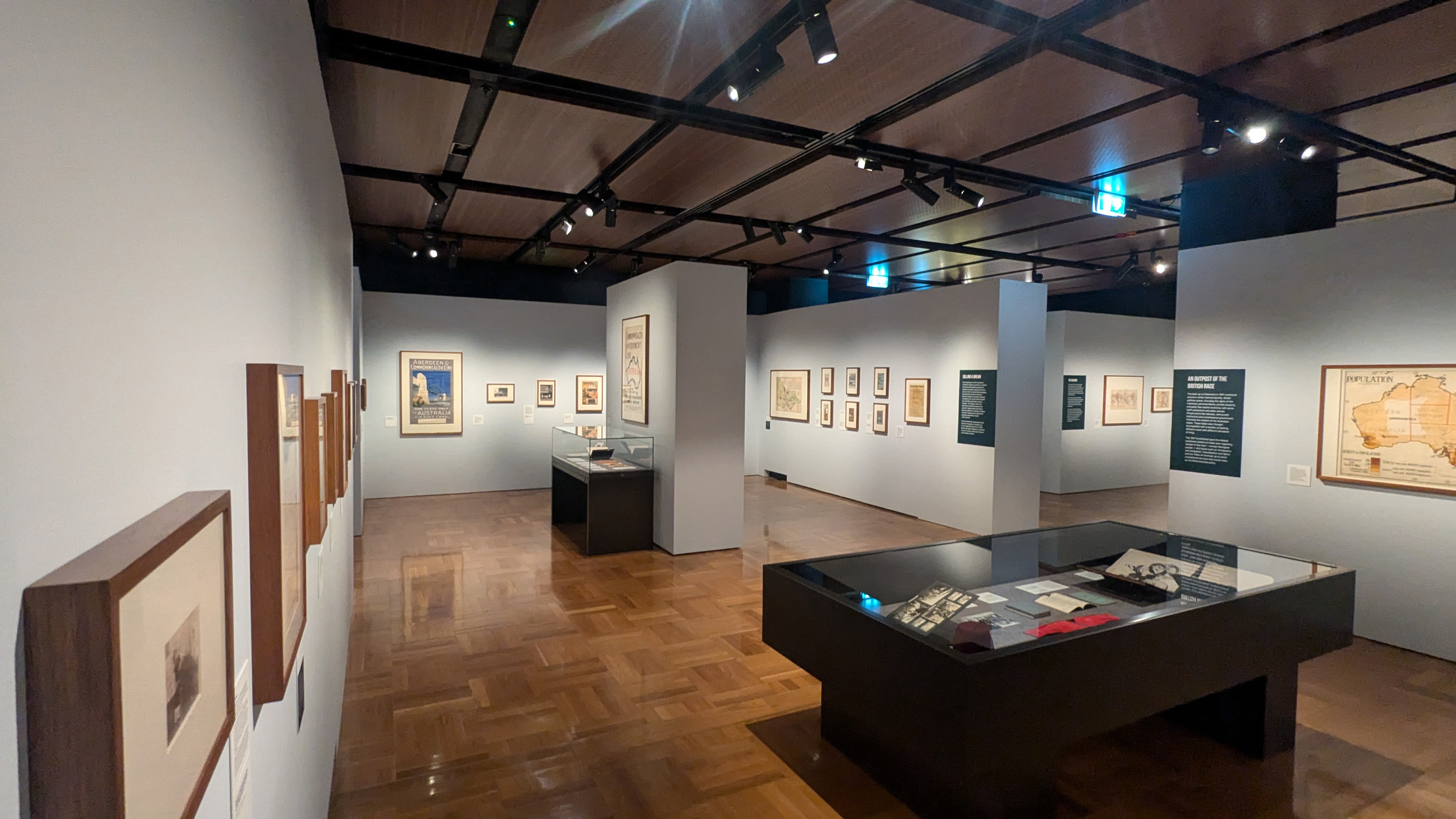 Original photograph of a specific section of the "Hopes and Fears" Exhibition. That effectively showcases the wide range of different historical artefacts are on display. 