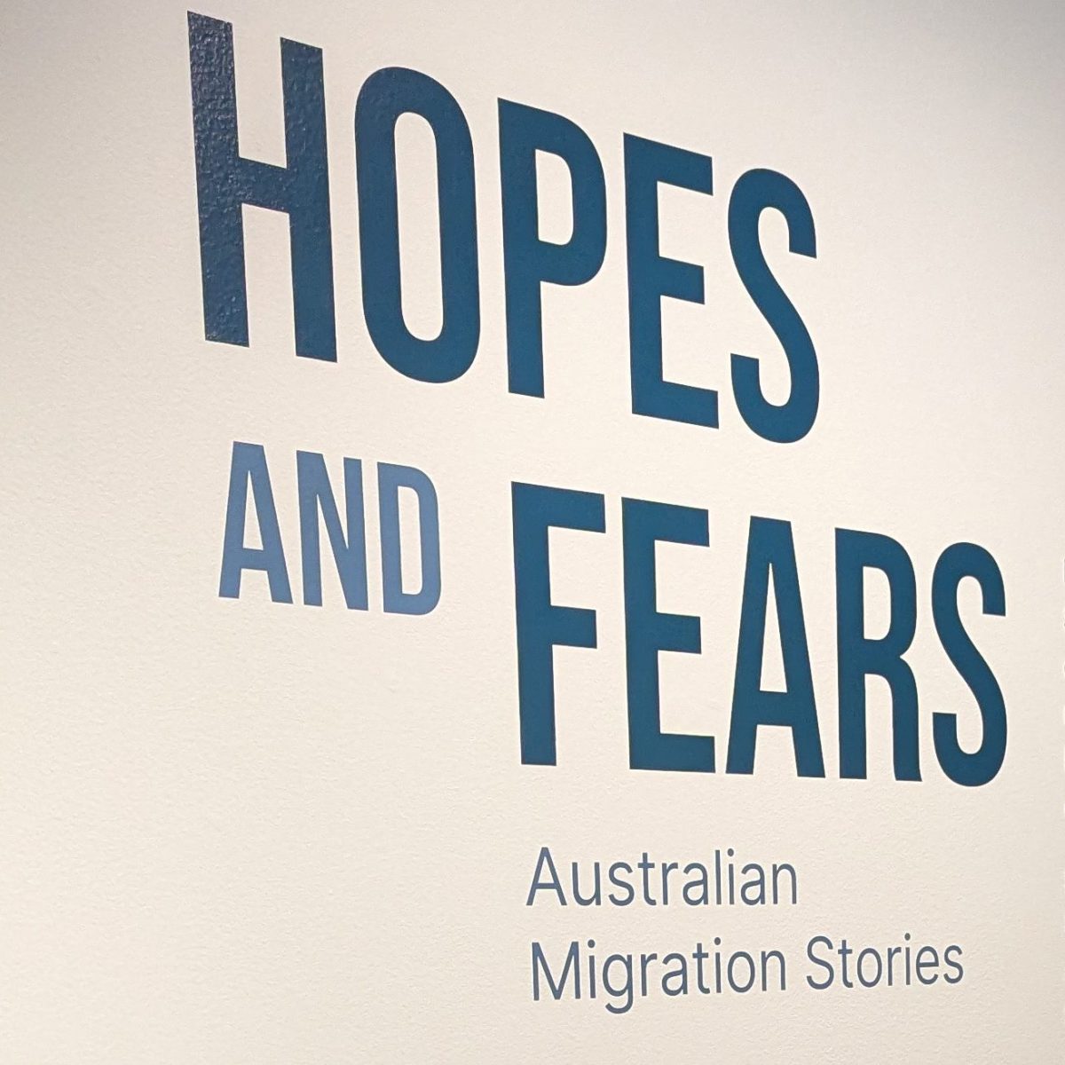 Original Photograph of the Hopes and Fears: Australian Migration Stories logo that can be found in the entrance of the exhibition