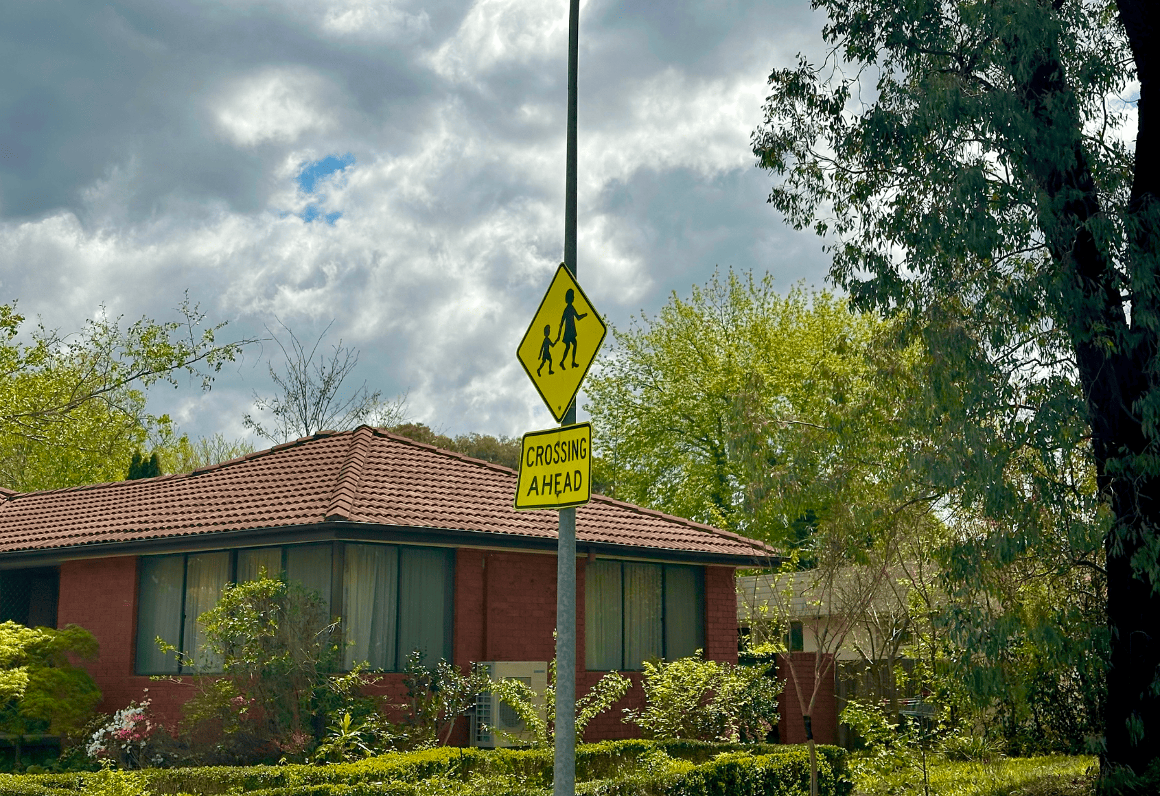 Children crossing ahead sign.