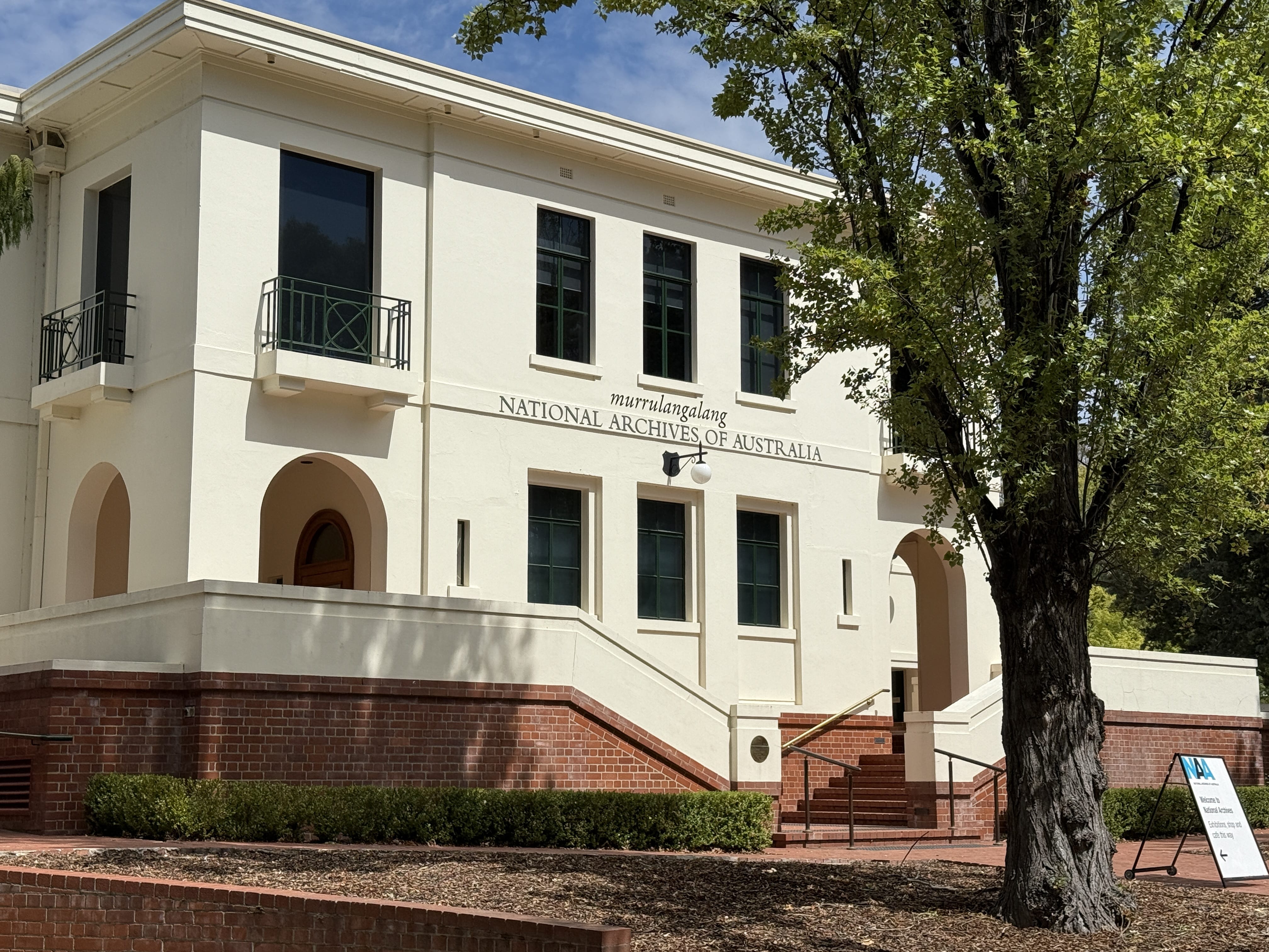 A straight view of the National Archives of Australia, showing its modern architectural design