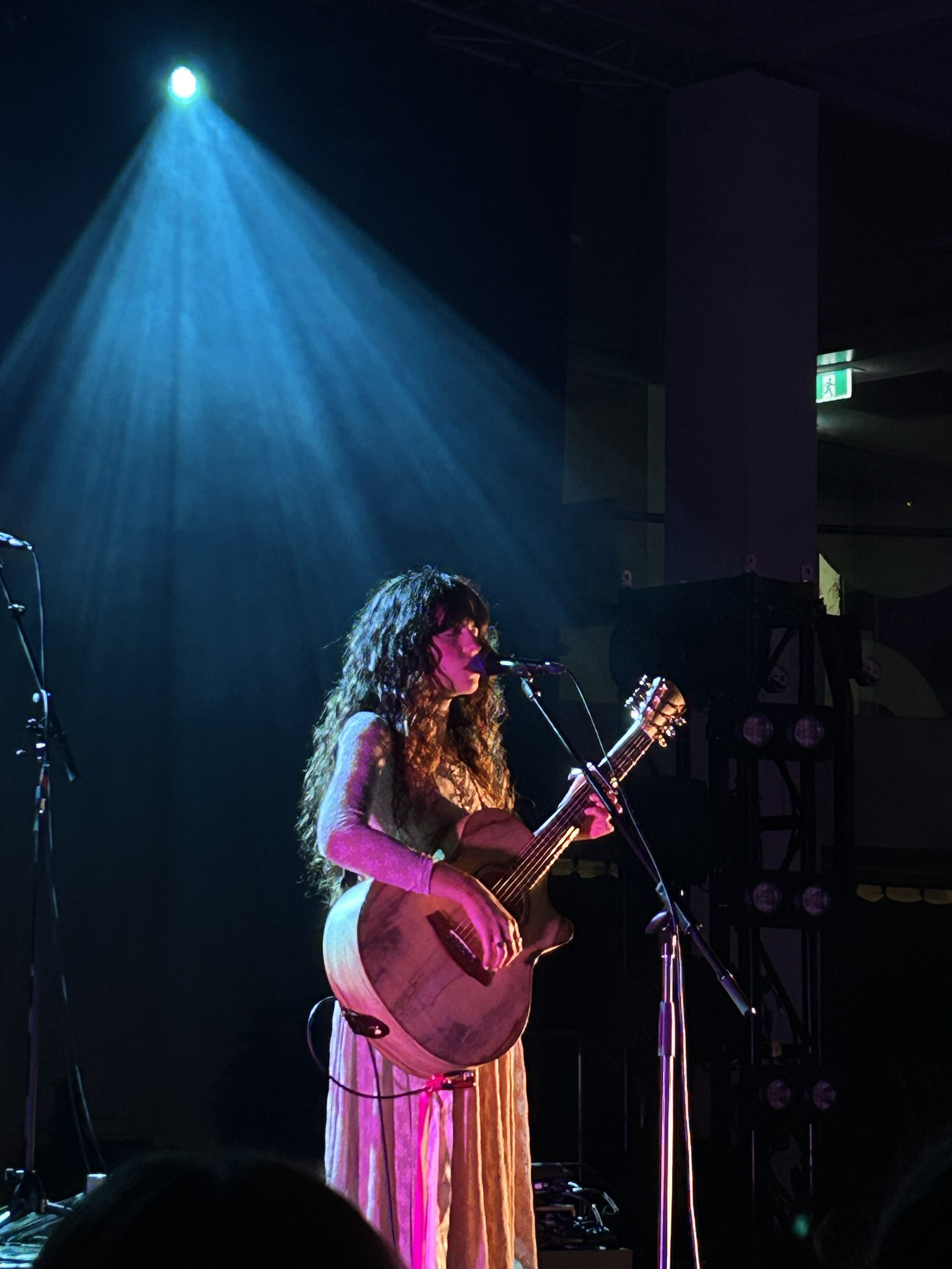Azure Ryder, the shows opener, playing guitar and singing