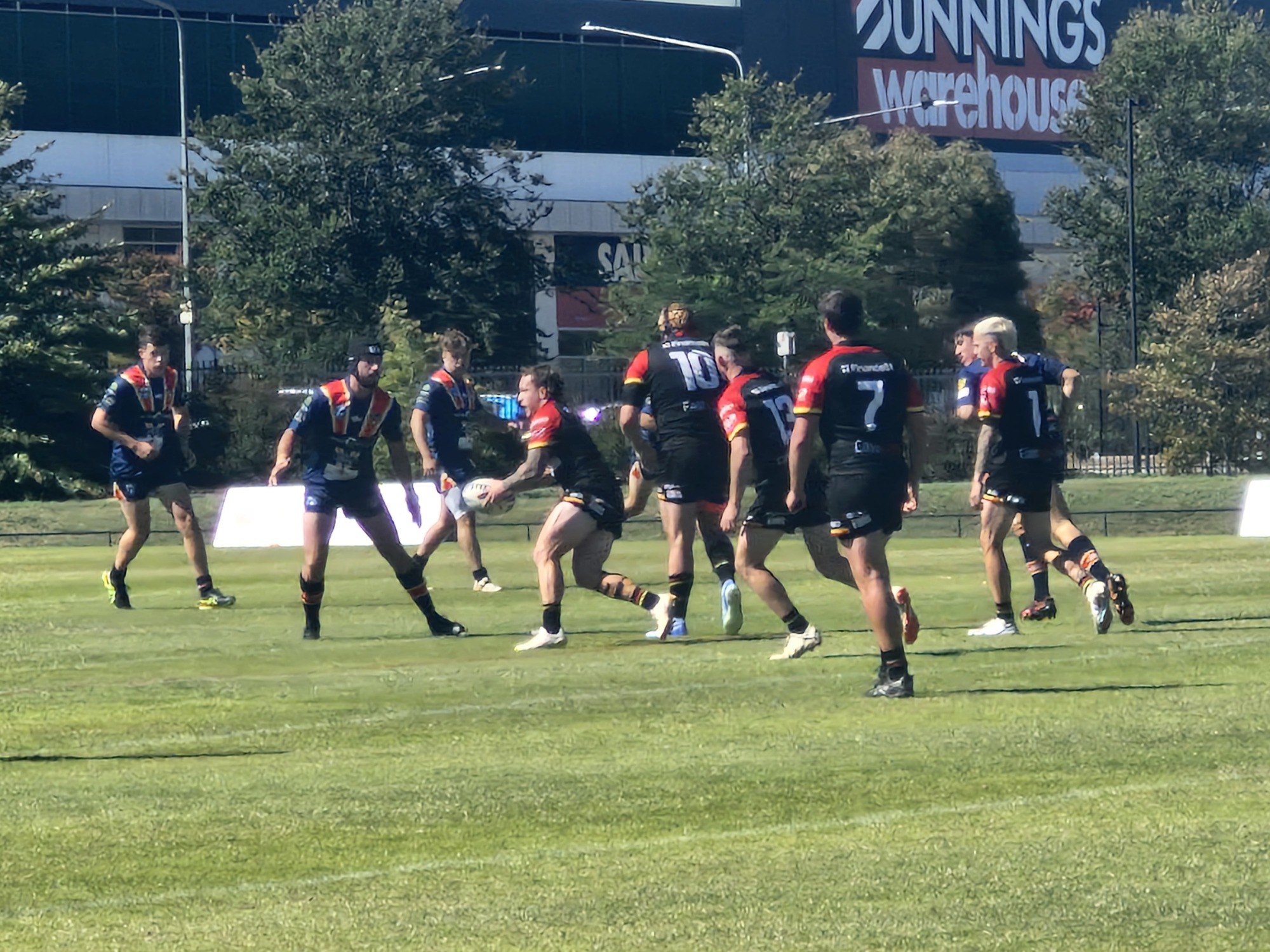 Gungahlin Bull player hits line ready to give a short pass