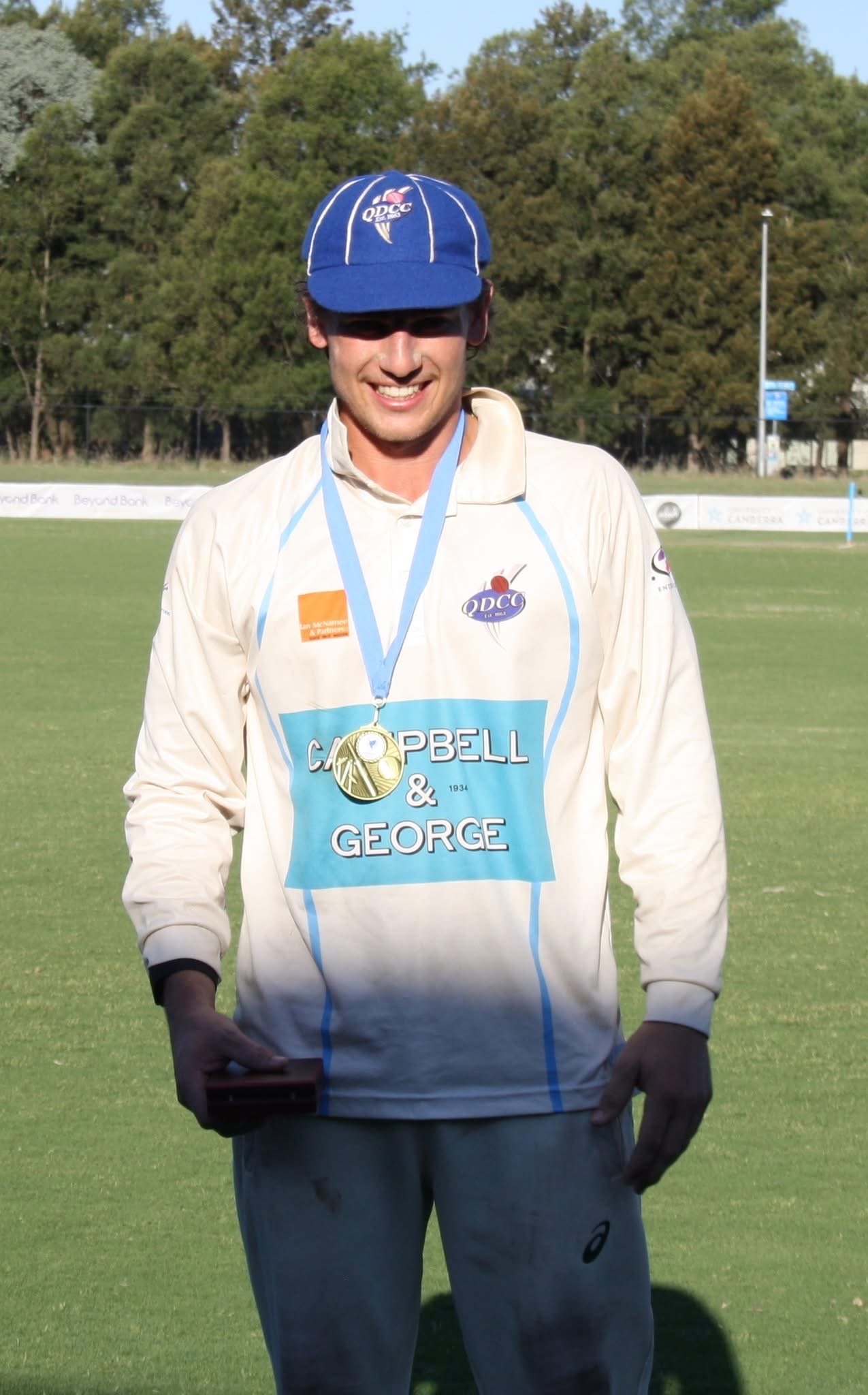 Queanbeyan Wicket Keeper Michael McNamara wearing the Greg Irvine medal.
