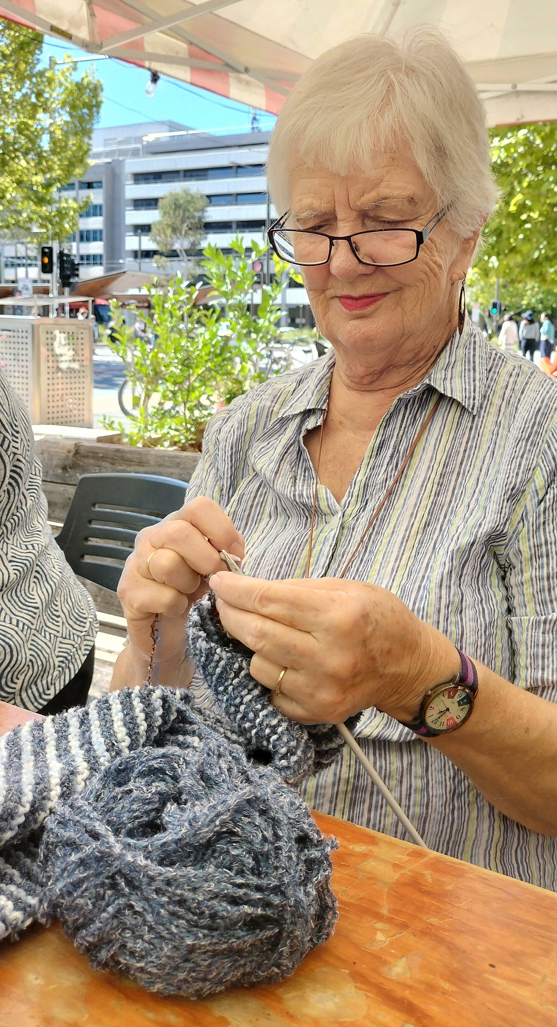 Angela knitting scarf