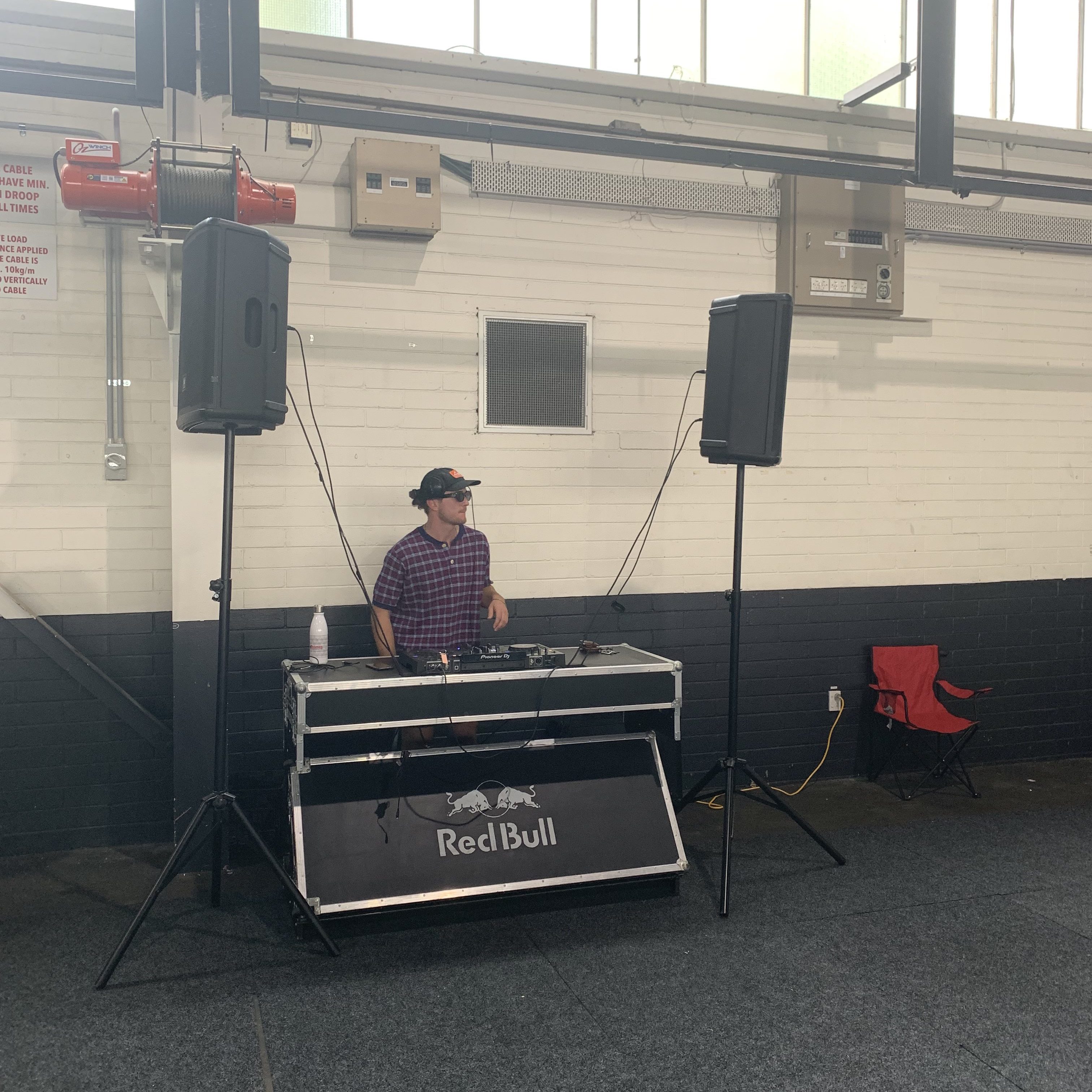 DJ playing at a redbull sponsored booth