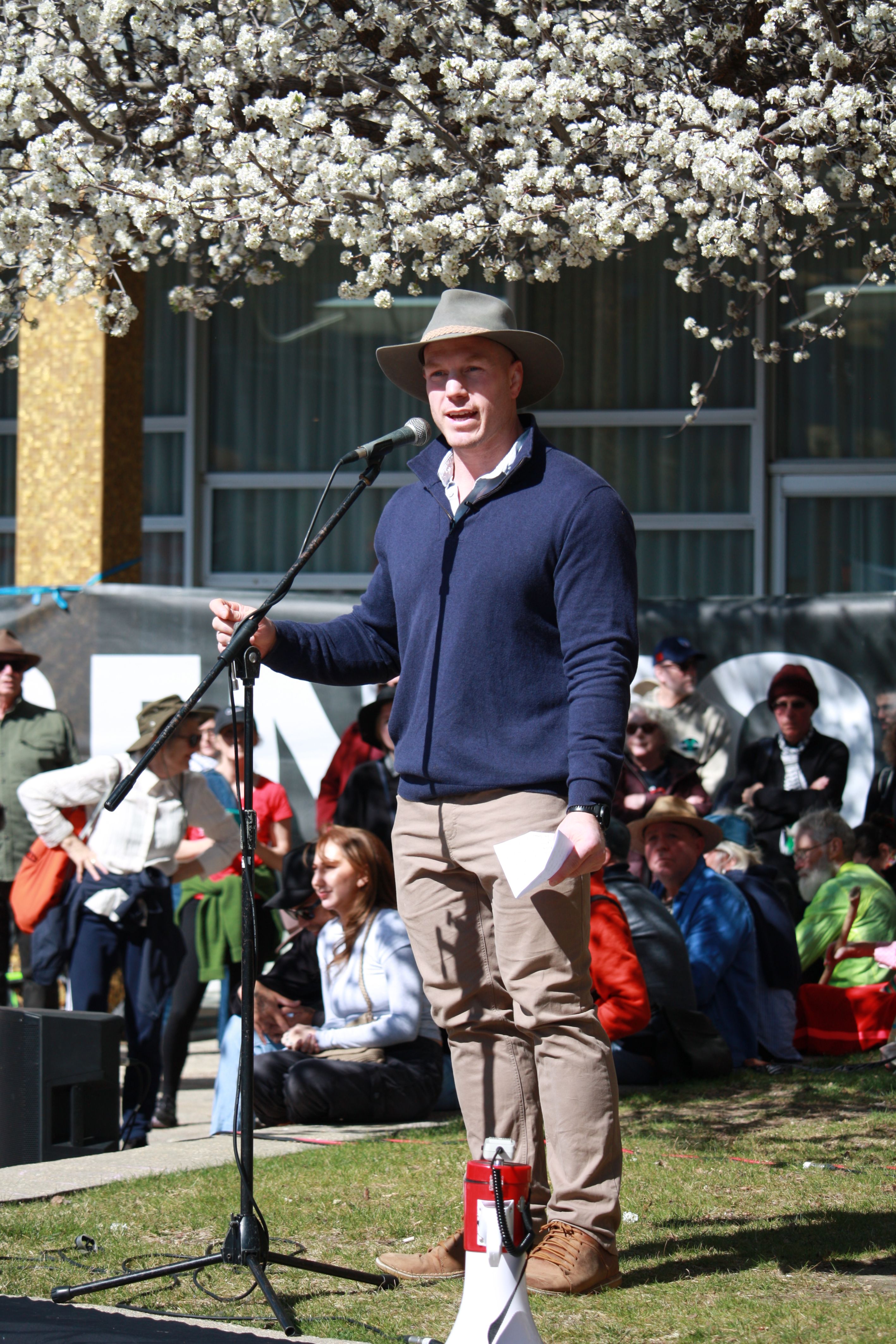 Senator David Pocock giving a speech at the rally.