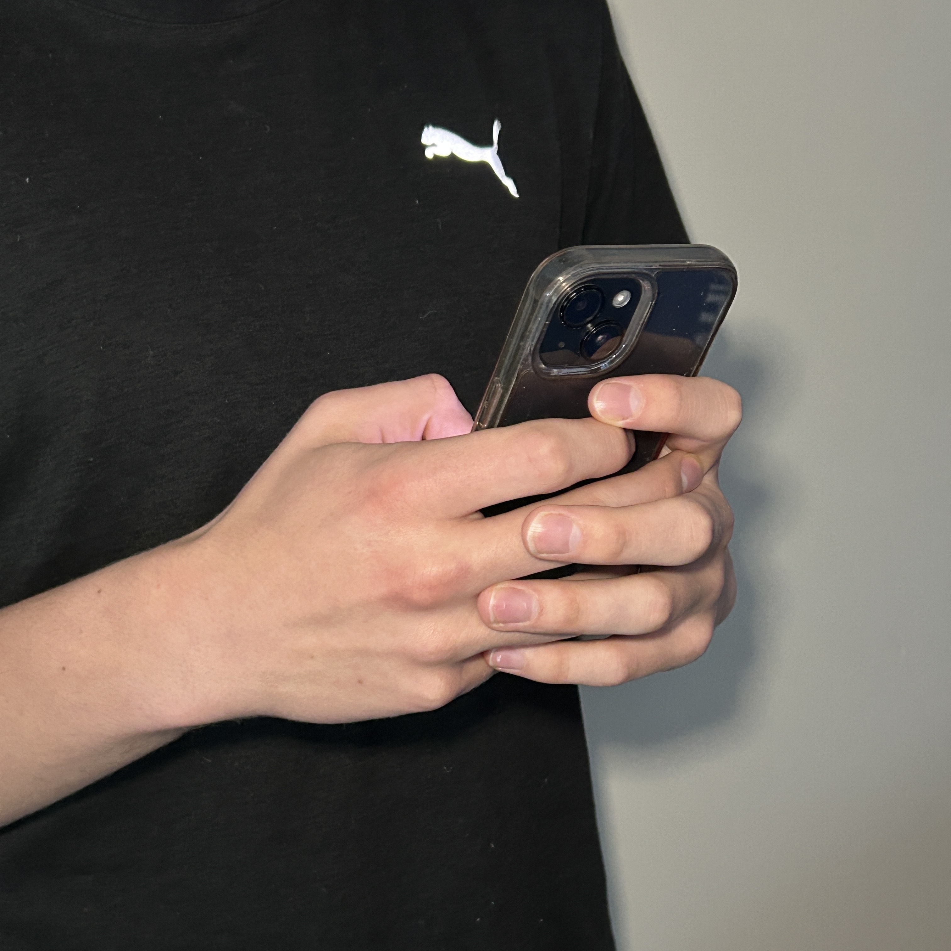 Person holding their phone