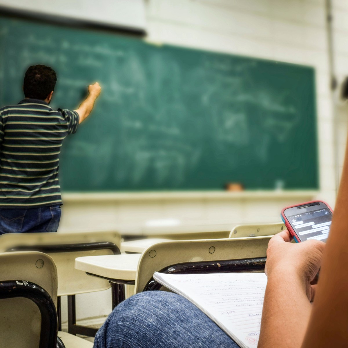 Kid on their phone in class