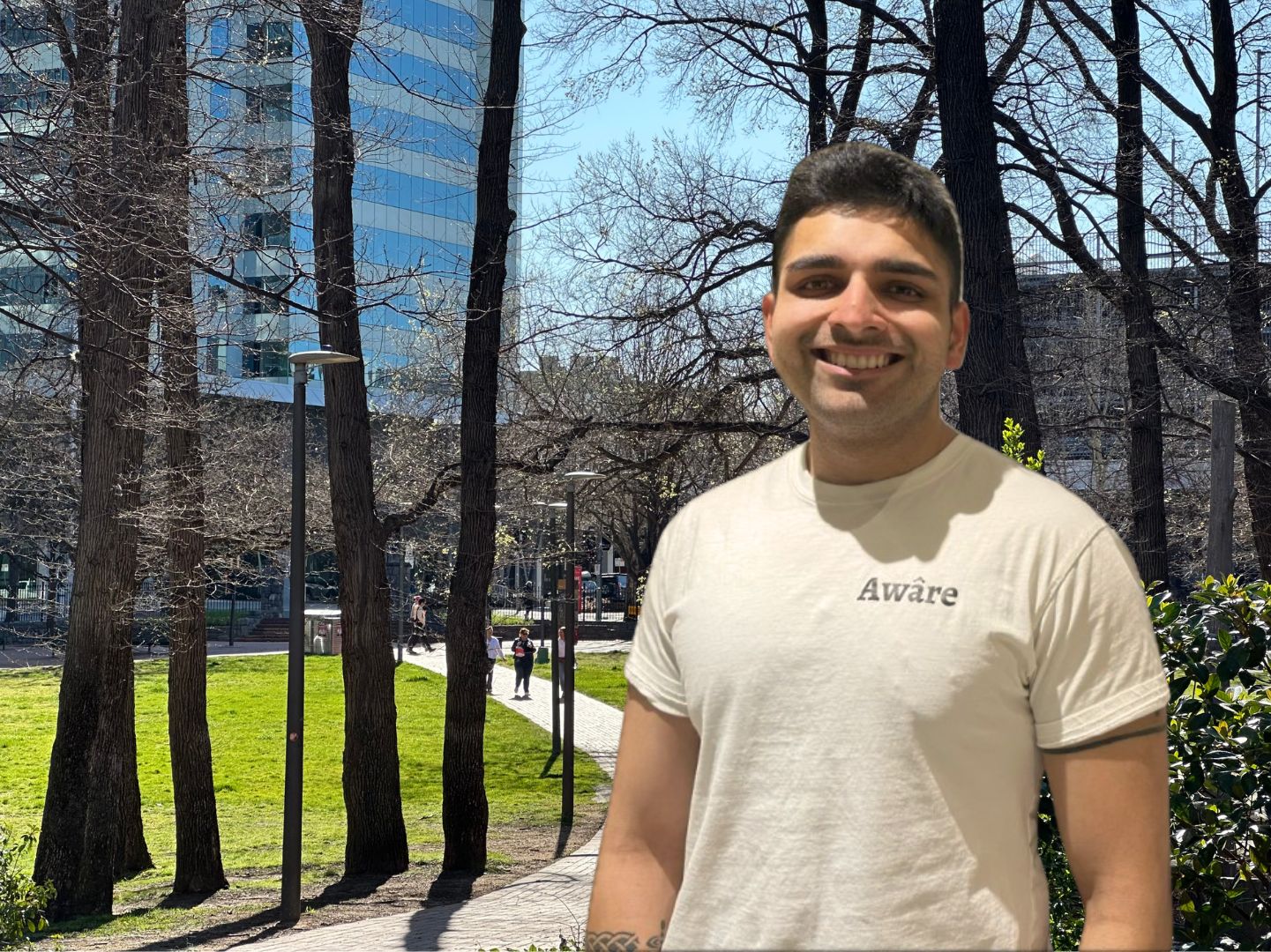 Akash, founder of Awâre, standing in Glebe Park.