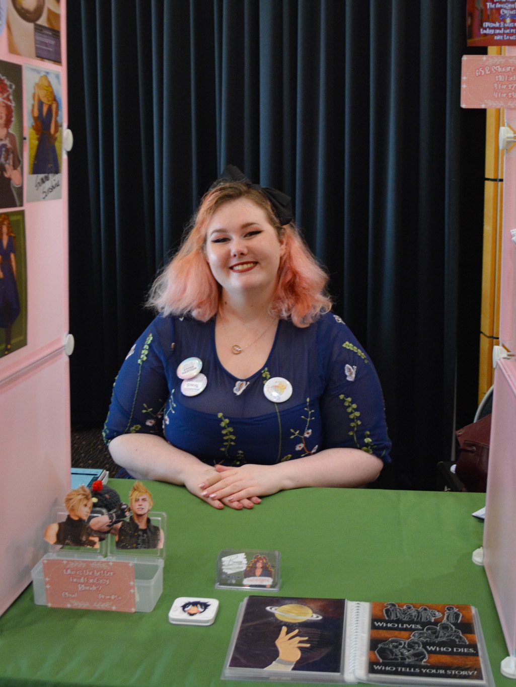 Breezy seated at her market stall