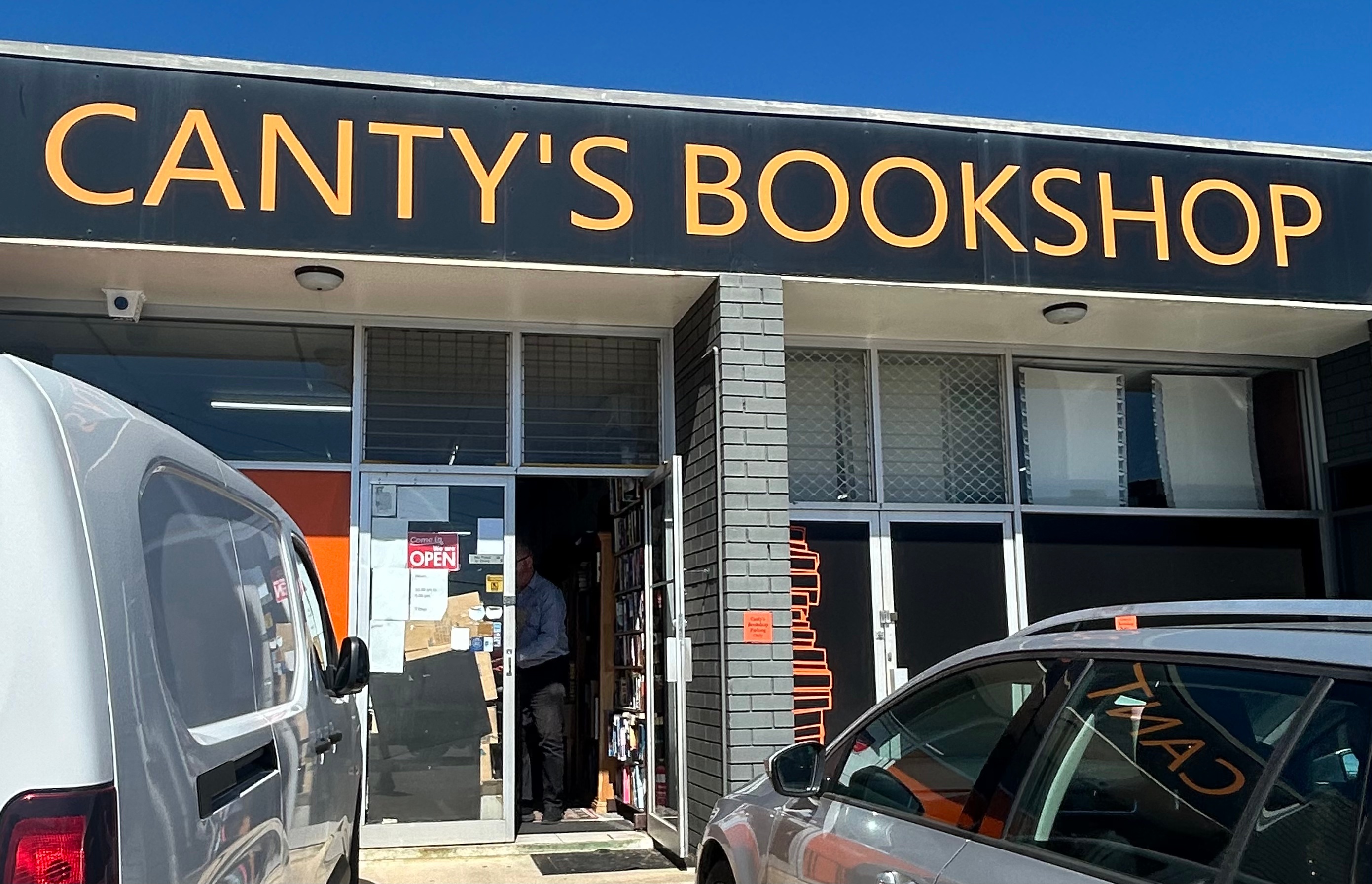 Outside of Canty's bookshop featuring Luke Canty at work. 
